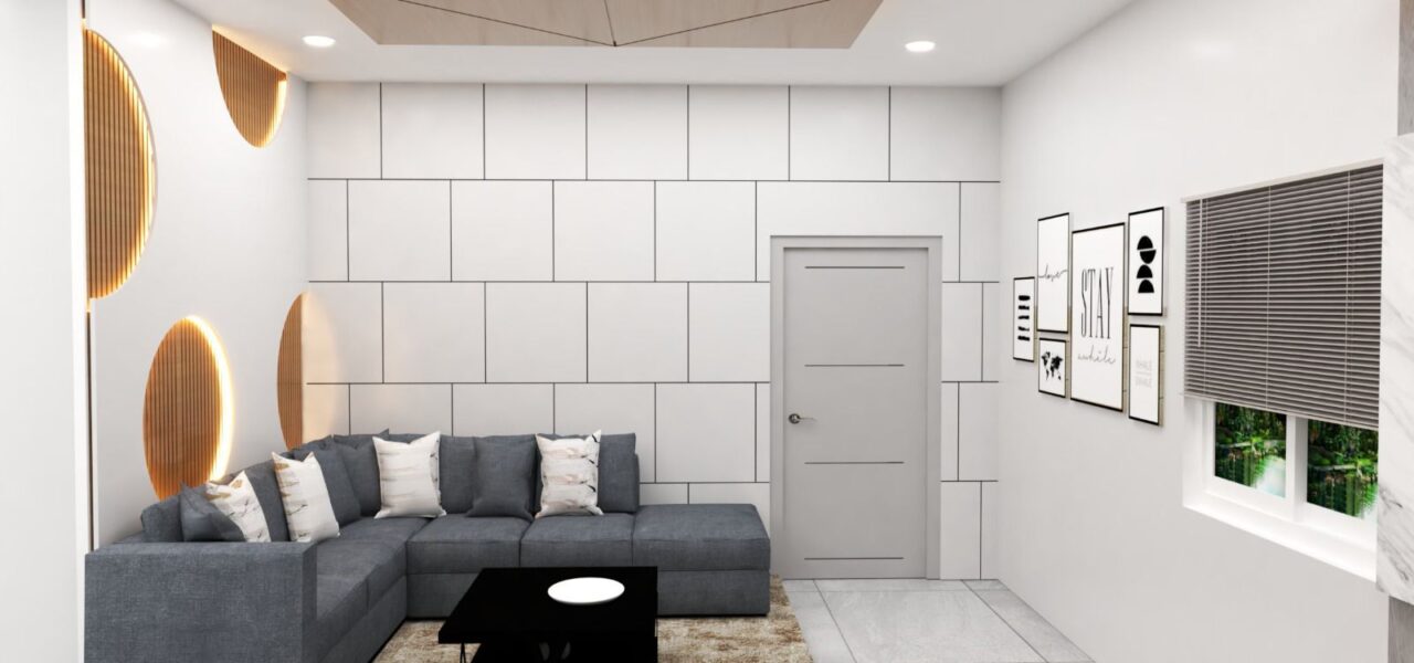 Living room with a gray sectional sofa, artistic wall decor, and soft lighting.